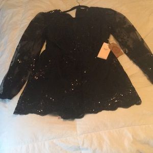 Super cute black sequin romper !